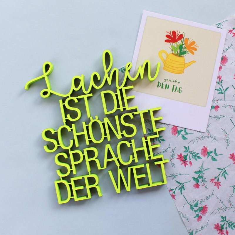 NoGallery Schriftzug Lachen ist die schönste Sprache der Welt - neongelber 3D Schriftzug bei Nauli and Stories