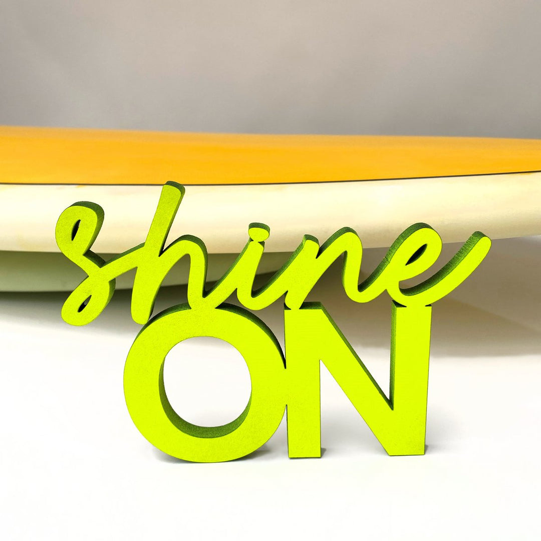 NoGallery Schriftzug shine ON  -  neongelber 3D Schriftzug aus Holz bei Nauli and Stories