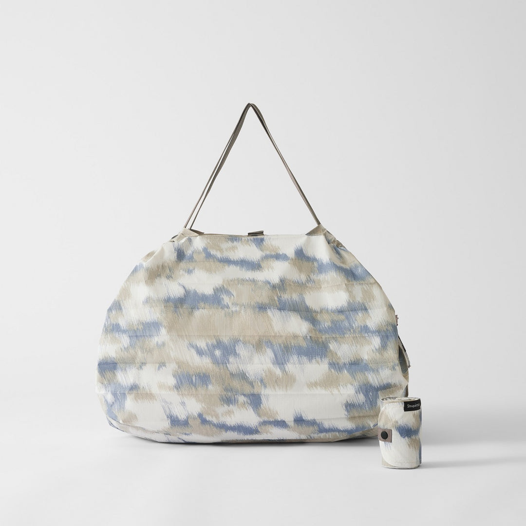 Shupatto Einkaufstasche Shupatto kompakte Falttasche  L - Floating Clouds bei Nauli and Stories