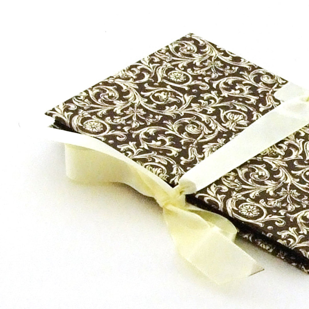 Nauli Leporello Leporello Renaissance Ornament braun mit beigem Satinband bei Nauli and Stories