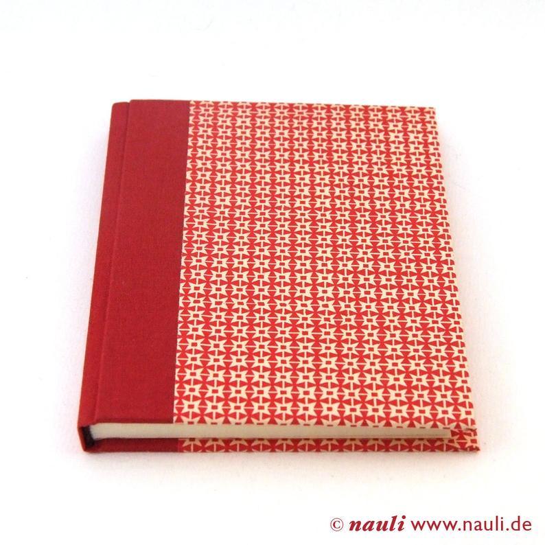 Nauli Notizbuch DIN A6 kleines Notizbuch DIN A6 Zackenstern  rot bei Nauli and Stories