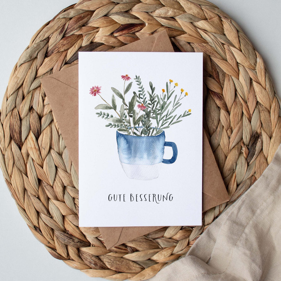 Paperlandscape Genesung Genesungskarte Gute Besserung mit blauer Tasse bei Nauli and Stories