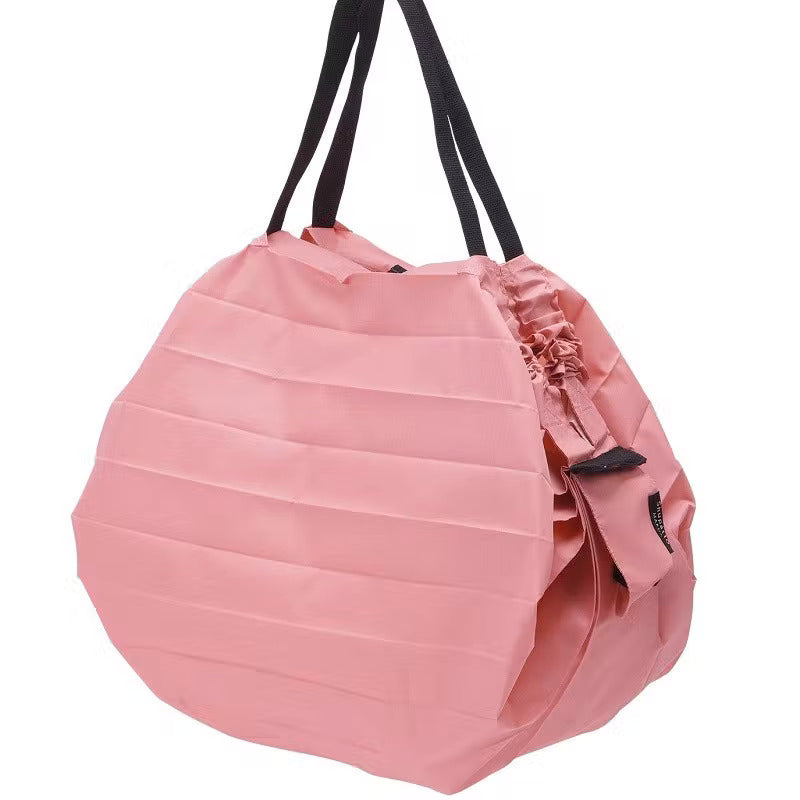 Shupatto Einkaufstasche Shupatto rosa kompakte Falttasche M - uni / Momo bei Nauli and Stories