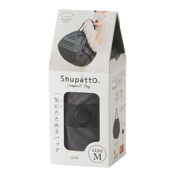 Shupatto Einkaufstasche Shupatto schwarze kompakte Falttasche M - Charcoal (Sumi) bei Nauli and Stories